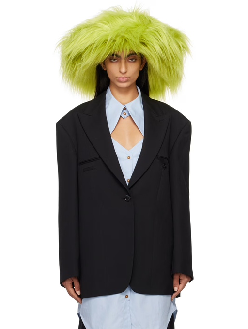 A woman wearing Ruslan Baginskiy green faux-fur fedora