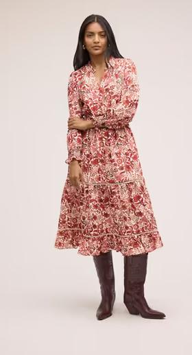 A woman wearing Sam Edelman​ maya midi dress