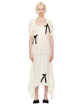 A woman wearing Yuhan Wang off-white puff sleeve midi dress