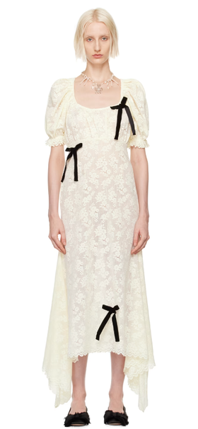 A woman wearing Yuhan Wang off-white puff sleeve midi dress