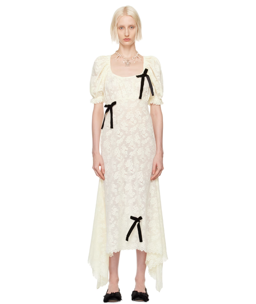 A woman wearing Yuhan Wang off-white puff sleeve midi dress