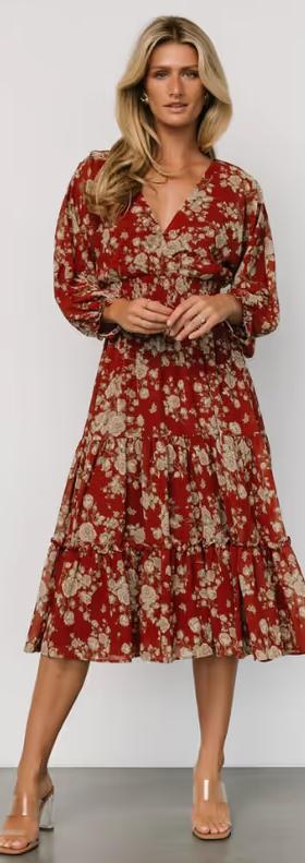 A woman wearing Baltic Born​ coventry tiered midi dress