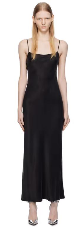 A woman wearing THIRD FORM black lip service bias maxi dress