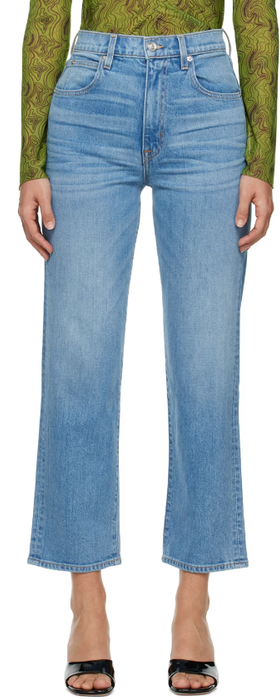 A woman wearing SLVRLAKE blue london crop jeans