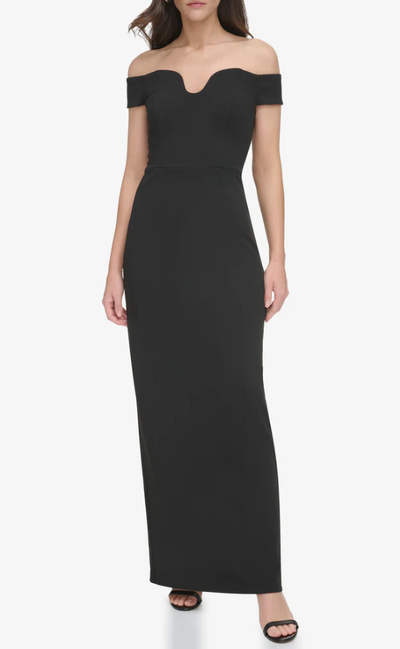 A woman wearing Vince Camuto off-the-shoulder contoured-neckline gown