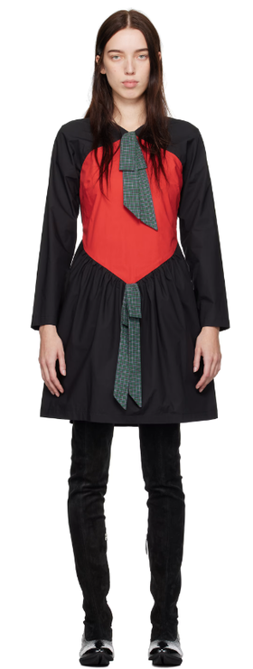 A woman wearing SC103 black & red scene minidress