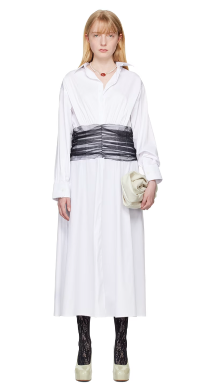 A woman wearing Renaissance Renaissance white drew maxi dress