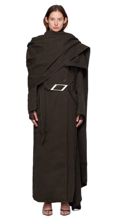 A woman wearing The Attico ssense exclusive brown long trench coat