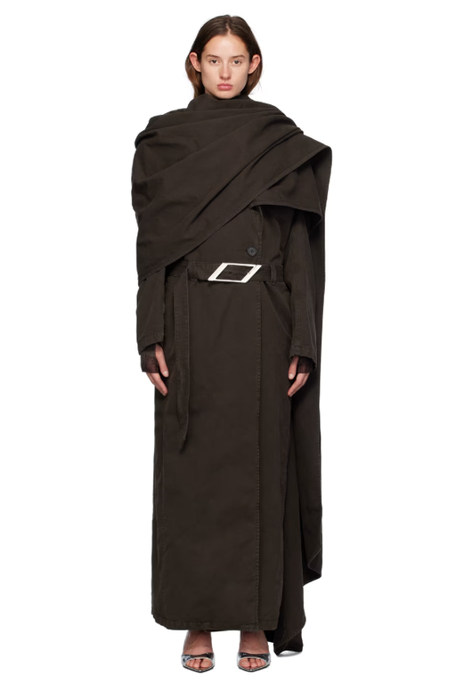 A woman wearing The Attico ssense exclusive brown long trench coat