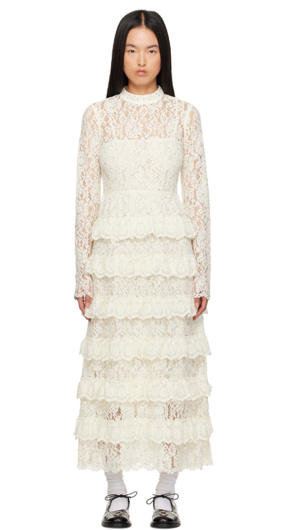 A woman wearing SEA NY off-white seraphina maxi dress