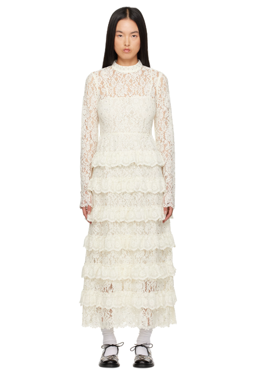 A woman wearing SEA NY off-white seraphina maxi dress