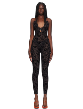 A woman wearing Poster Girl black scarlett jumpsuit