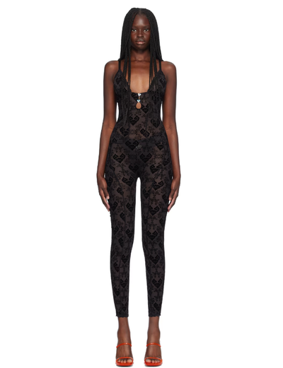A woman wearing Poster Girl black scarlett jumpsuit