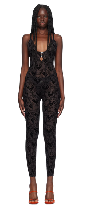 A woman wearing Poster Girl black scarlett jumpsuit
