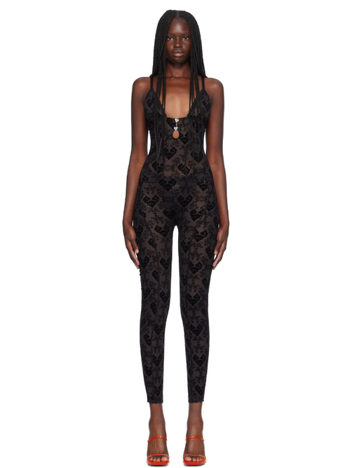 A woman wearing Poster Girl black scarlett jumpsuit