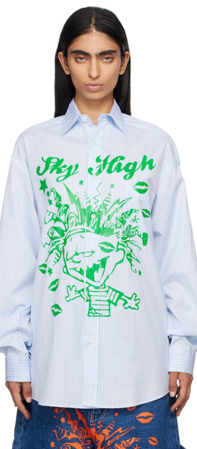 A woman wearing Sky High Farm Workwear blue mindblown print shirt