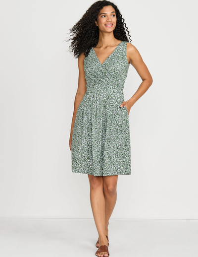 A woman wearing Lands End women's front fit and flare dress