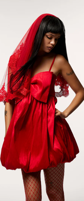 A woman wearing Betsey Johnson​ megan bow dress red