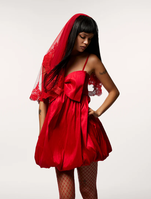 A woman wearing Betsey Johnson​ megan bow dress red