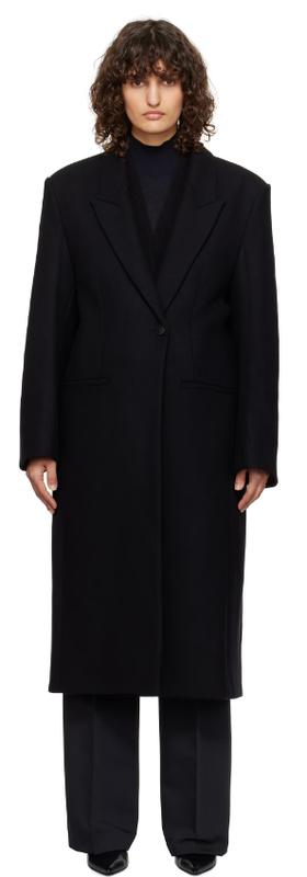 A woman wearing Róhe black opera coat