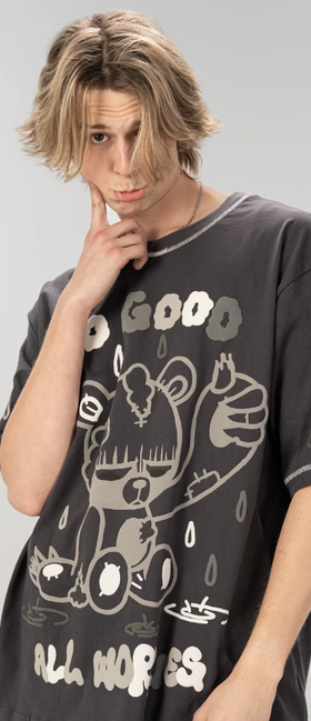 A man wearing cool shirtz​ the all worries tee