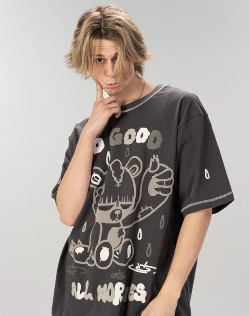A man wearing cool shirtz​ the all worries tee