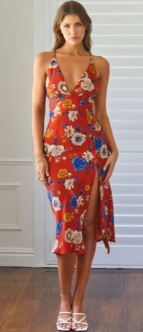 A woman wearing Stelly jude midi dress red print red print