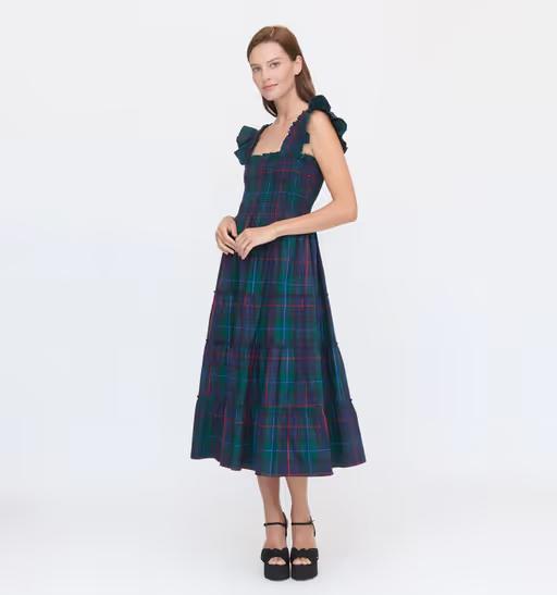 A woman wearing Hill House the ellie nap dress