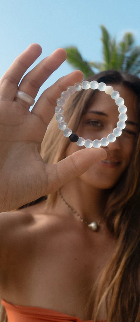 A woman with Lokai classic bracelet