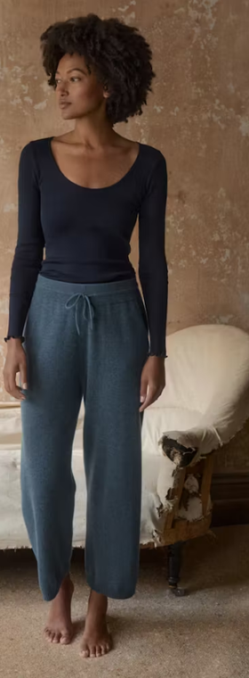 A woman wearing Poetry​ clothing scoop-neck top