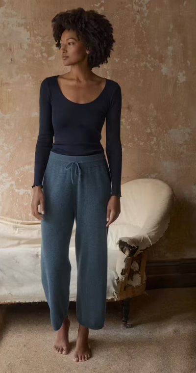 A woman wearing Poetry clothing scoop-neck top