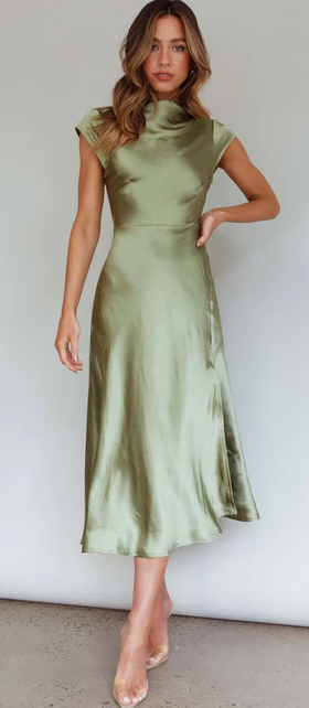 A woman wearing Selfie Leslie​ lucinda twist back midi dress olive