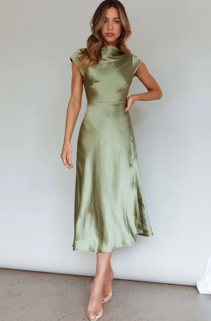 A woman wearing Selfie Leslie lucinda twist back midi dress olive