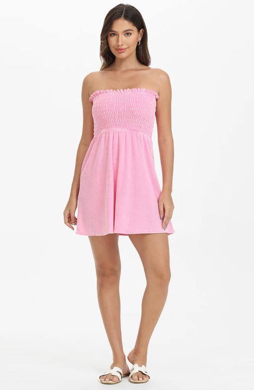 A woman wearing Juicy Couture towel terry smocked dress