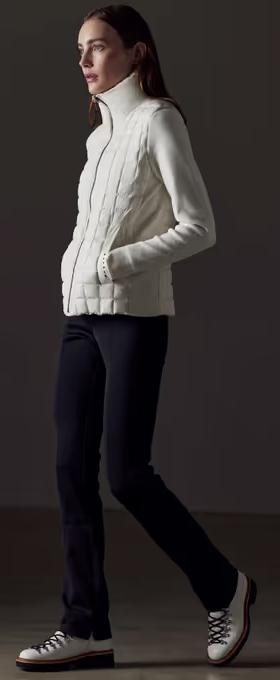 A woman wearing AETHER​ Apparel phase full-zip