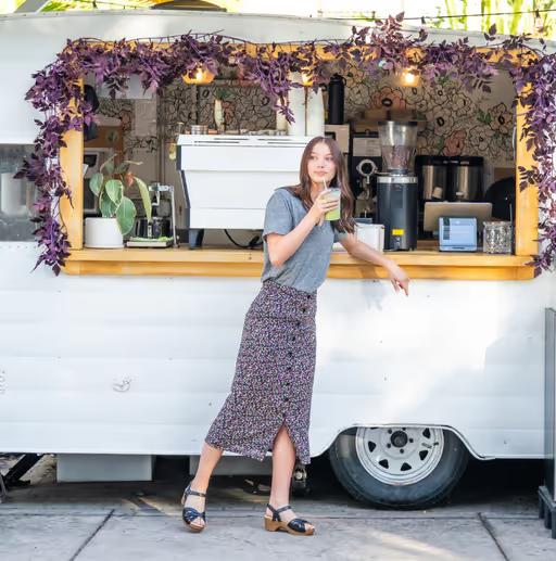 A woman wearing Dansko​ black full grain sandal