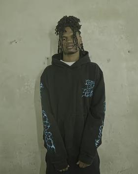 A man wearing 4tune azula hoodie