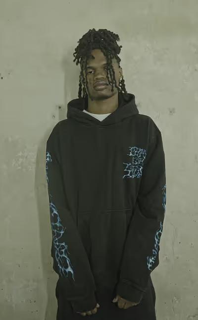 A man wearing 4tune​ azula hoodie