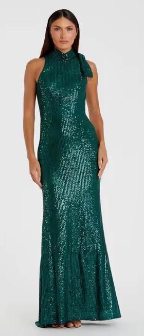 A woman wearing Mac Duggal​ sequined soft tie halter neck column gown