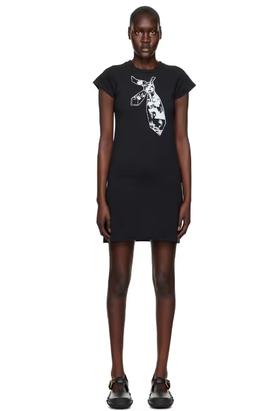 A woman wearing Rose Murdoch black edith minidress