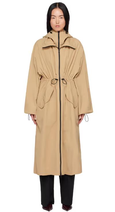 A woman wearing WARDROBE.NYC beige rosie huntington-whiteley edition rhw anorak