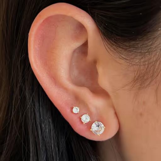 A woman wearing Evry Jewels​ ice ice baby earrings