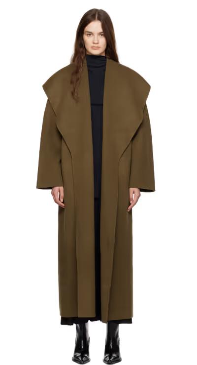 A woman wearing TOVE khaki ondine coat