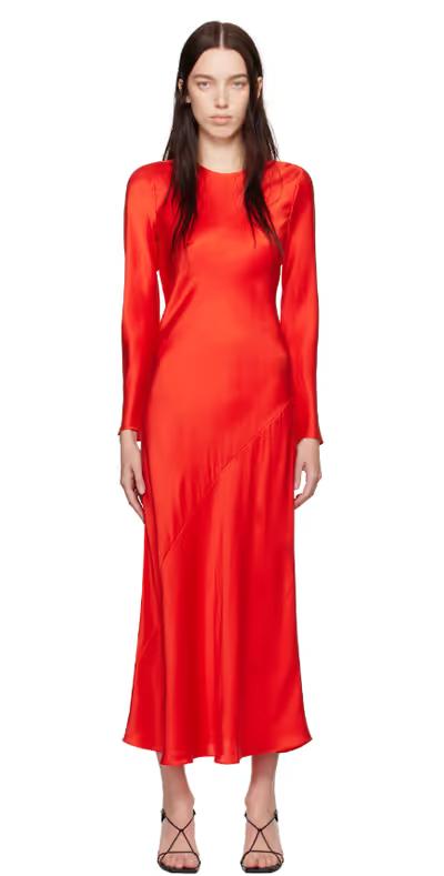 A woman wearing Silk Laundry red full sleeve bias maxi dress