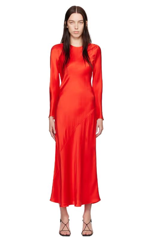 A woman wearing Silk Laundry red full sleeve bias maxi dress