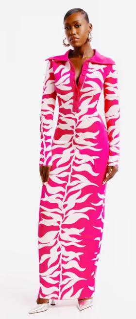 A woman wearing Hanifa fuchsia and white soraya maxi