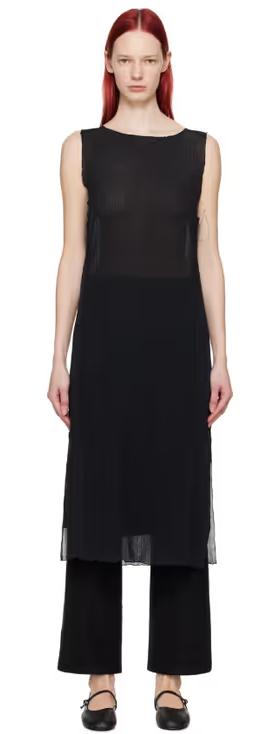 A woman wearing Youth black lettuce edge midi dress