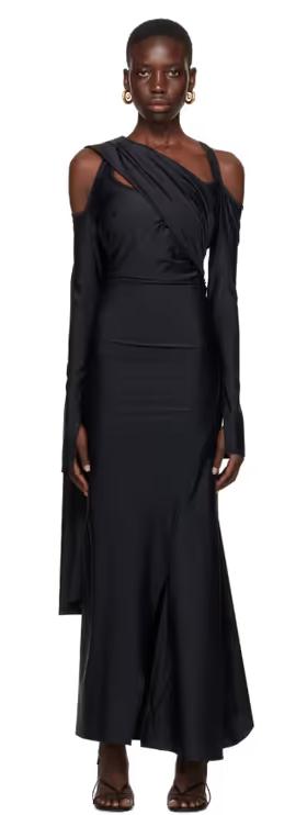 A woman wearing SRVC black siren maxi dress
