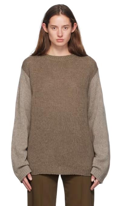 A woman wearing Sofie D'Hoore gray matcha sweater