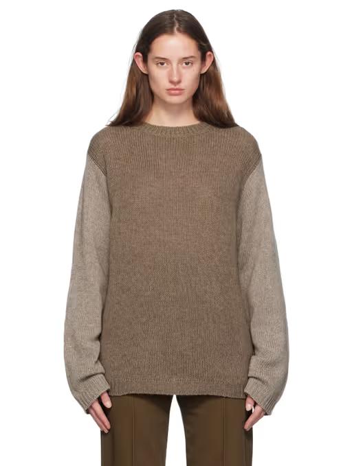 A woman wearing Sofie D'Hoore gray matcha sweater